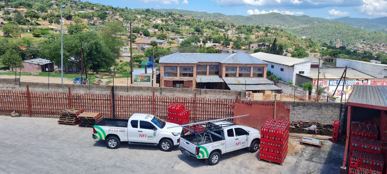 Two NFI WiFi service bakkies working in the community